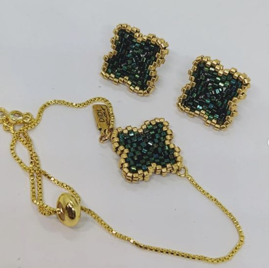 Imagen de JUEGO PULSERA ARETES TREBOL DOBLE