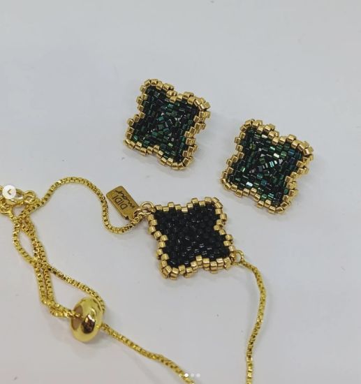 Imagen de JUEGO PULSERA ARETES TREBOL DOBLE