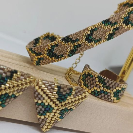 Imagen de JUEGO PULSERA ARETES Y ANILLO ESCAMAS